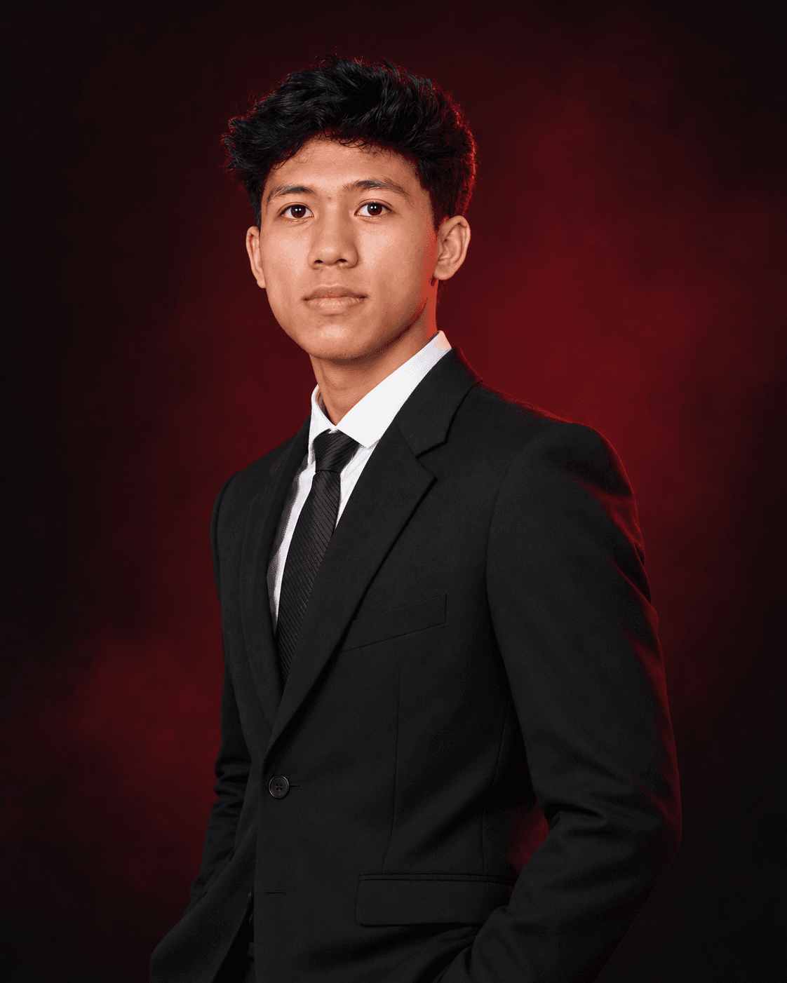 Adlan Fakhruzzaman wearing a black suit